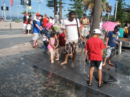 Children playing on The Corso, Manly Beach Children playing on The Corso, Manly Beach