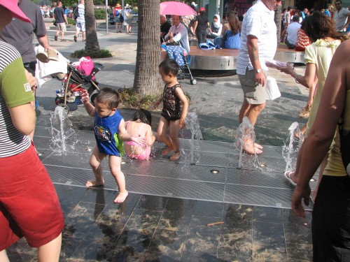 Children playing in water on The Corso, Manly Beach Children playing in water on The Corso, Manly Beach